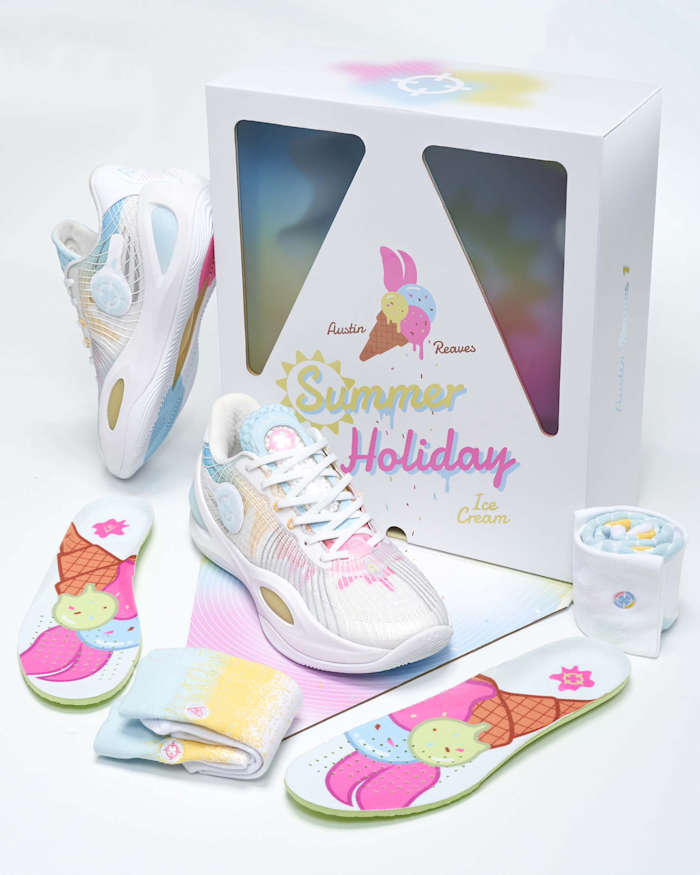 View of Austin Reaves white sneakers and box.